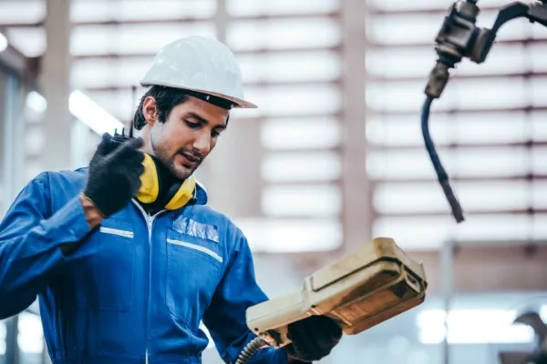 Young worker analyzing a construction site.